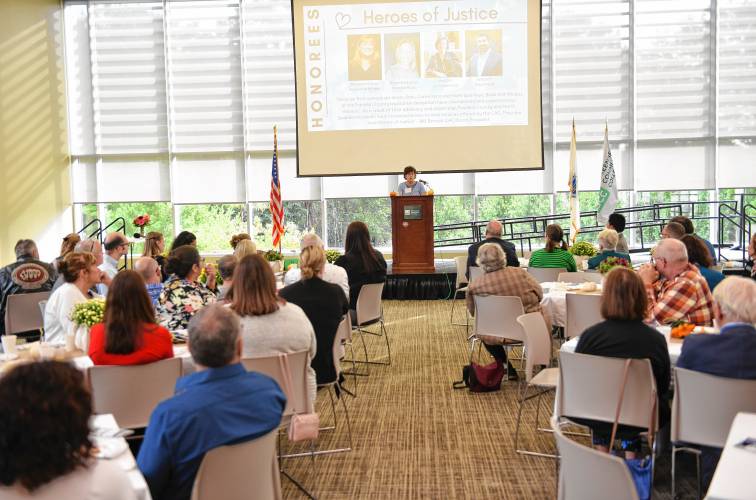 Donna Lloyd speaks at the Children’s Advocacy Center’s Hope, Healing & Help Breakfast at Greenfield Community College on Friday morning.