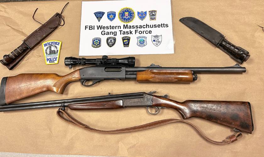 Sheri Sulewski, 58, of Greenfield, has pleaded not guilty in Holyoke District Court to two counts of carrying a firearm without a license. She is being held on $5,000 bail after reportedly being seen walking on High Street carrying these weapons — two shotguns and two military Ka-Bar knives — in a trash bag.