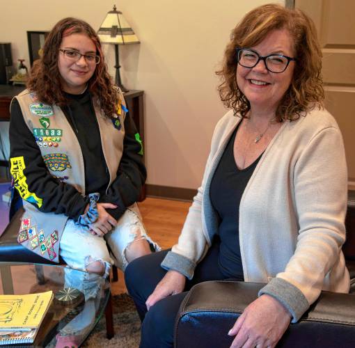 Pattie Hallberg, CEO of Girl Scouts of Central and Western Massachusetts, with Harmonie Garcia, a current Girl Scout. Hallberg will retire at the end of the year after 16 years.