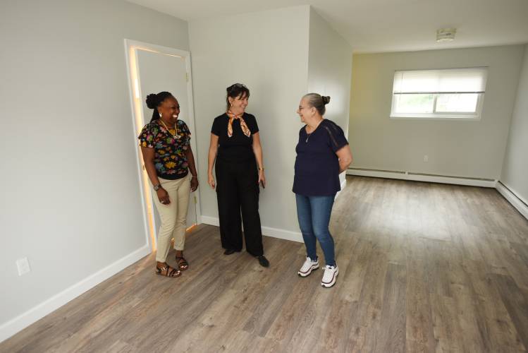 From left, Greenfield Gardens Property Manager Dedra Lewis; Caroline Murray, owner’s property manager for the nonprofit Homesavers Council of Greenfield Gardens; and Andrea Goldman, president of the Homesavers Council, in a renovated unit. Health inspectors are requesting the assistance of the Board of Health as they deal with ongoing concerns from tenants about rodents at Greenfield Gardens.