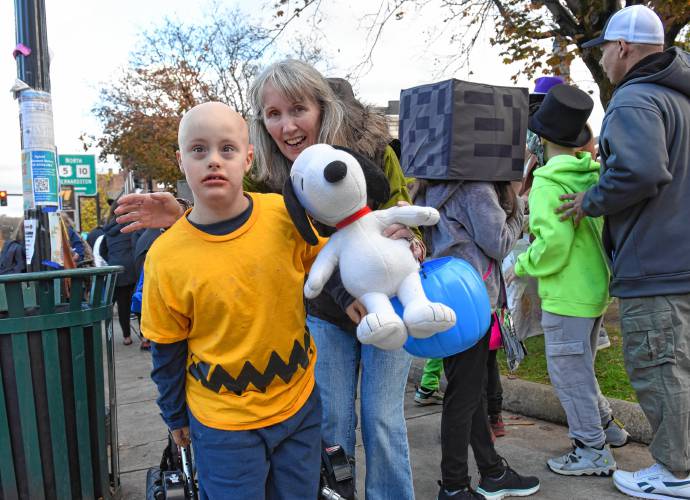 Charlie Brown and Snoopy on the Greenfield Common on Halloween.