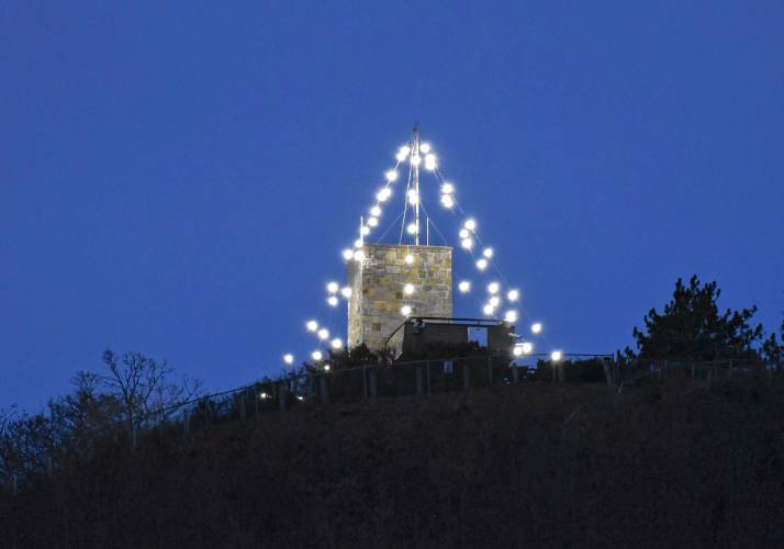 The holiday lights atop Mount Sugarloaf in South Deerfield as seen from Whately.