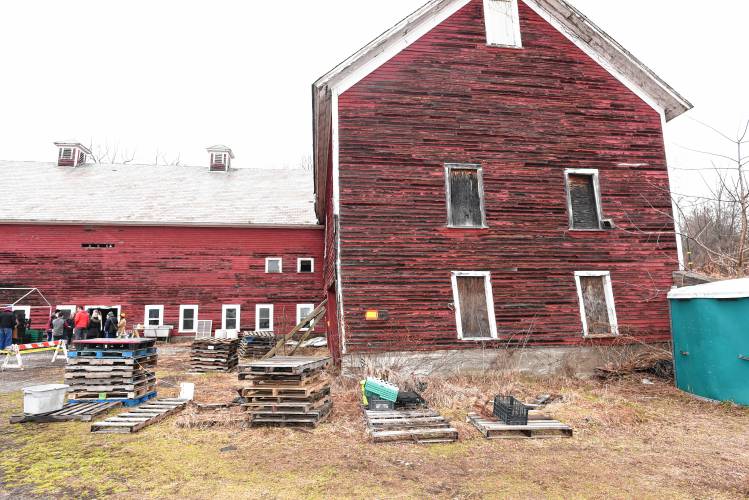 The attached barn at right is collapsing on its foundations at Just Roots farm in Greenfield.