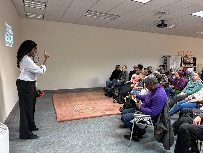 Dr. Khama Ennis speaks about her “Faces of Medicine” documentary series at The LAVA Center in Greenfield on Friday. The series is centered on the paths of Black female physicians in the United States.