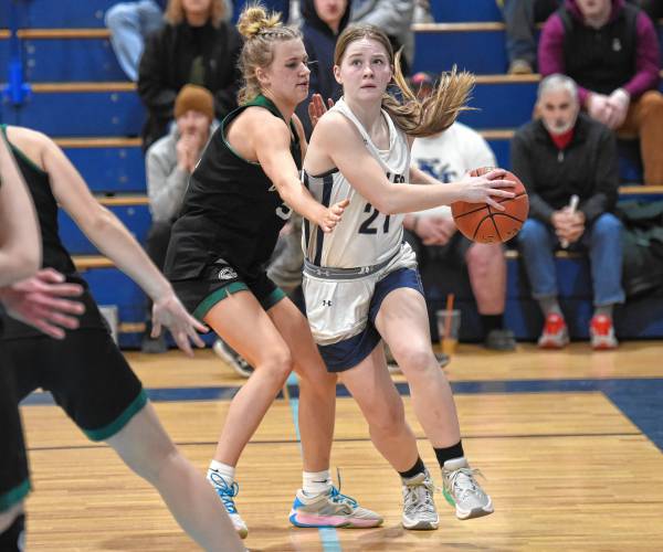 Franklin Tech’s Hannah Gilbert is defended by Greenfield’s Gloria McDonald earlier this week in Turners Falls.