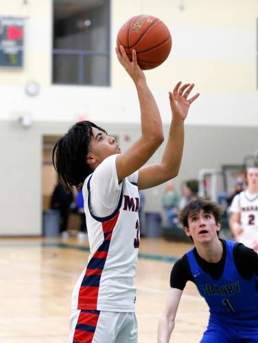 Mahar’s Lian Lopez-Baez (3) puts up a shot against Granby in the fourth quarter of the Western Mass. Class C boys basketball championship Saturday at Holyoke Community College.