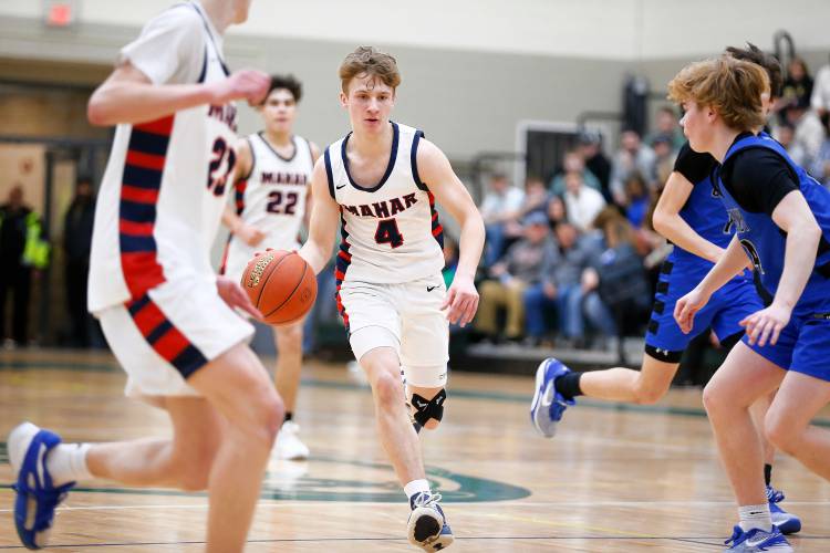 Mahar’s Lucas Isrow (4) drives down the court against Granby in the third quarter of the Western Mass. Class C boys basketball championship Saturday at Holyoke Community College.