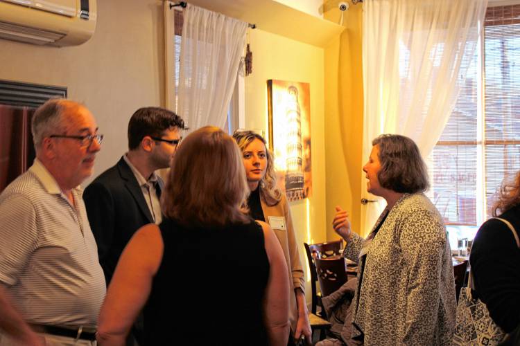 State Sen. Jo Comerford, D-Northampton, at right, speaks with Massachusetts Medical Society members from Franklin and Hampshire counties at Gianni Fig’s Ristorante in South Deerfield on Wednesday evening.