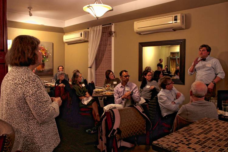 State Sen. Jo Comerford, D-Northampton, at left, speaks with Massachusetts Medical Society members from Franklin and Hampshire counties at Gianni Fig’s Ristorante in South Deerfield on Wednesday evening. Dr. Stephen Martin, who specializes in family medicine and addiction medicine specialist at UMass Memorial Health, is pictured standing at right.