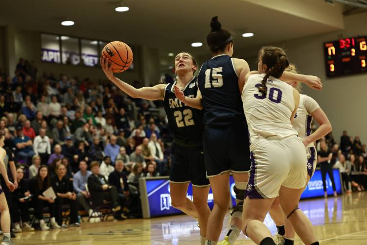 Smith College's Hannah Martin goes up for a layup on traffic against NYU on Saturday in the NCAA Div. III Women's National Championship Game in Columbus, Ohio.