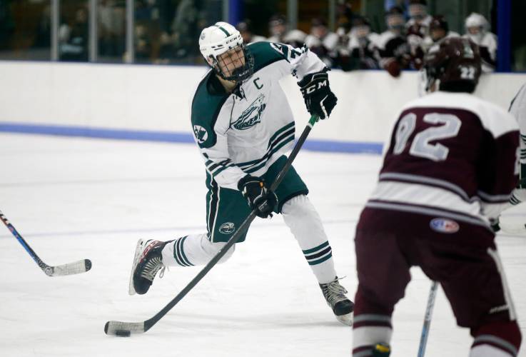 Greenfield’s Hunter Smith (7) fires a shot against Easthampton  this past season at Collins-Moylan Arena in Greenfield.