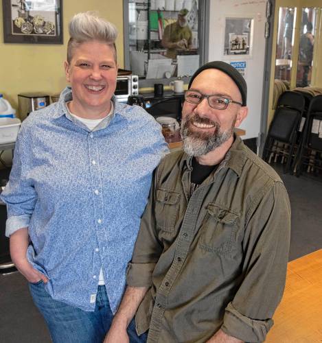 Kate Hunter, assistant manager in sales/marketing and a worker owner with Victor Signore, vegetable coordinator and worker owner, at Real Pickles in Greenfield.