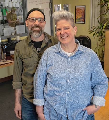 Kate Hunter, assistant manager in sales/marketing and a worker owner with Victor Signore, vegetable coordinator and worker owner, at Real Pickles in Greenfield.