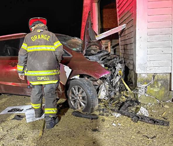 One person was taken to the hospital, and one declined transport, after a minivan crashed into the side of a South Main Street barn in Orange shortly after midnight on Friday.