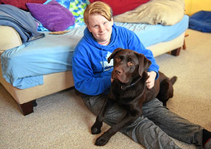 Rain Sanborn and his emotional support dog, Zeal.