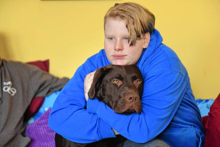 Rain Sanborn and his emotional support dog, Zeal.