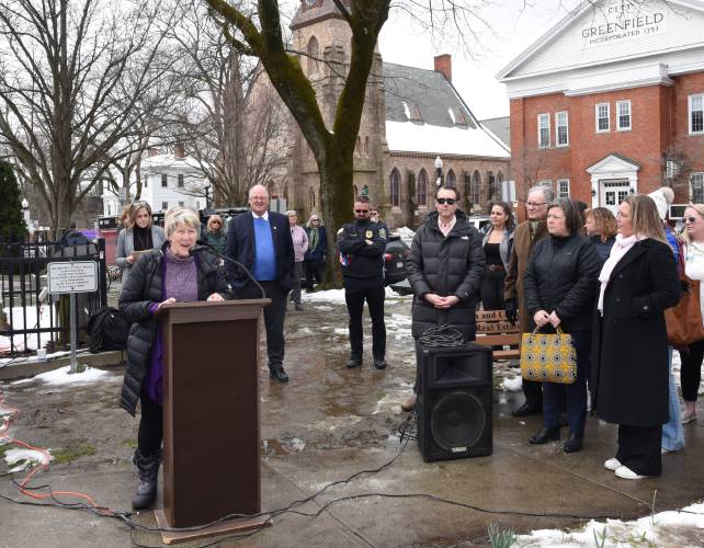 Greenfield Mayor Ginny Desorgher and other local officials speak on the Greenfield Common to mark Child Abuse Prevention Month on Friday morning.  