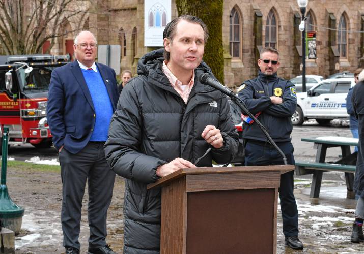 Jeffrey Trant, executive director of the Children’s Advocacy Center of Franklin County and the North Quabbin, speaks while flanked by Northwestern District Attorney David Sullivan and Greenfield Police Chief Todd Dodge on the Greenfield Common to mark Child Abuse Prevention Month on Friday morning.