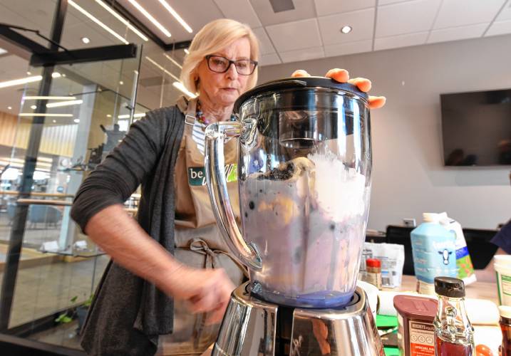 Dietitian Kathy Jordan leads a smoothie-making class emphasizing good nutrition on Tuesday at the Greenfield Public Library. 