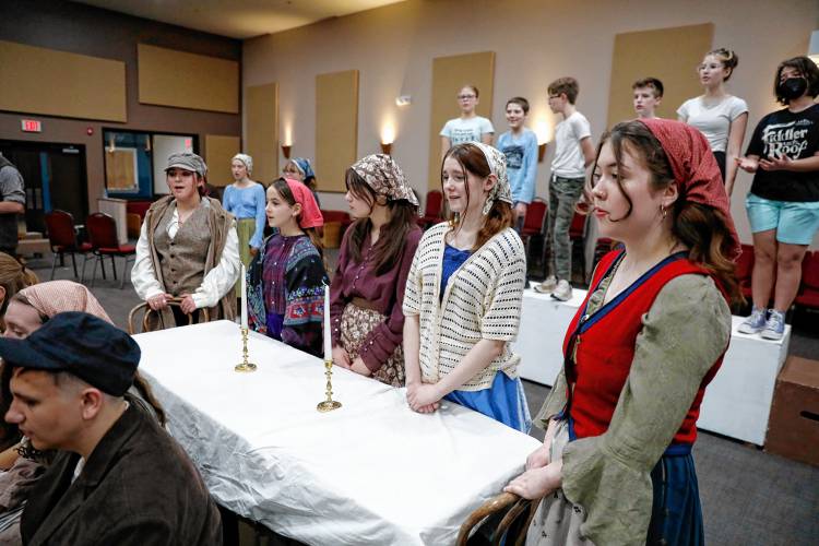 Cast members of Starlight’s Youth Theatre rehearse Saturday morning for their upcoming performance of “Fiddler on the Roof.”  