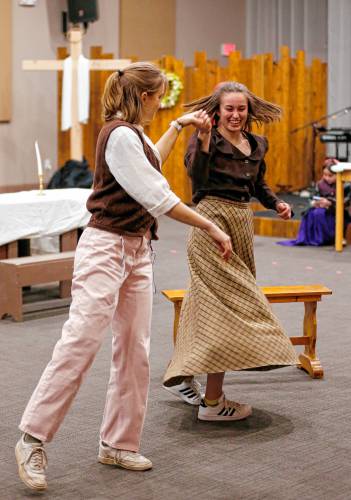 Cast members of Starlight’s Youth Theatre rehearse Saturday morning for their upcoming performance of “Fiddler on the Roof.”  