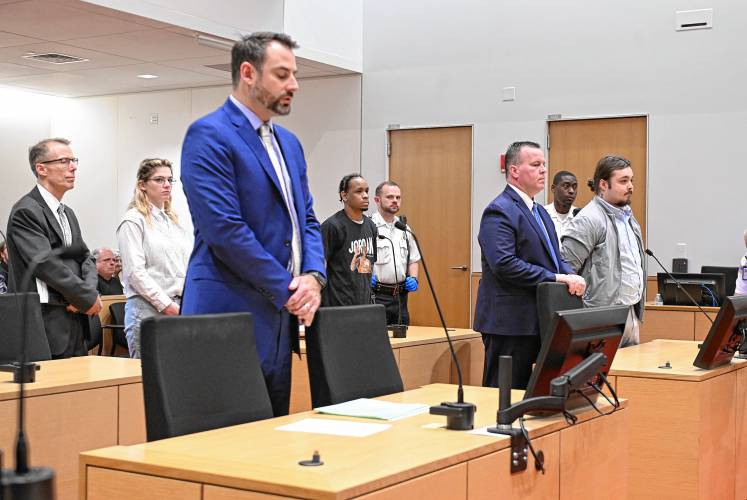 Jennica Chapin, Xavier Chadwell and Brendon Collette stand in Franklin County Superior Court on Tuesday with their attorneys and Assistant District Attorney Matthew Russo.