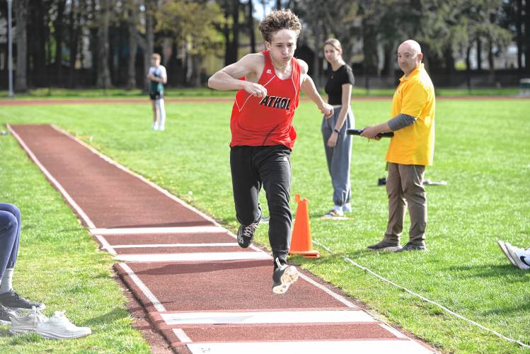 Athol’s Brady O’Connell competes in the triple jump during a meet in Greenfield on Wednesday. 