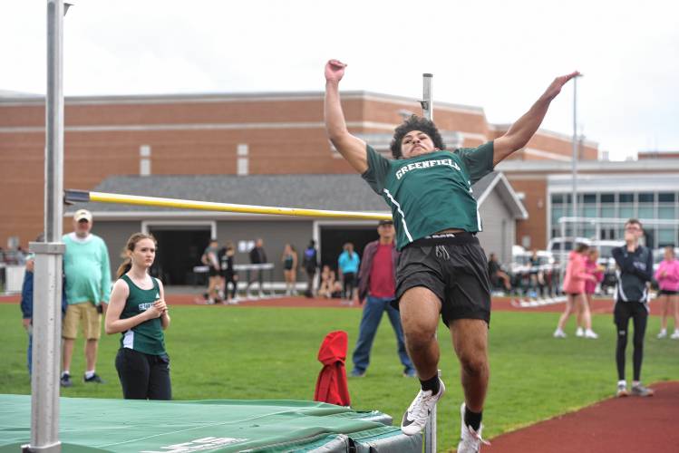 Greenfield’s Angel Politis competes in the high jump during a meet in Greenfield on Wednesday. 