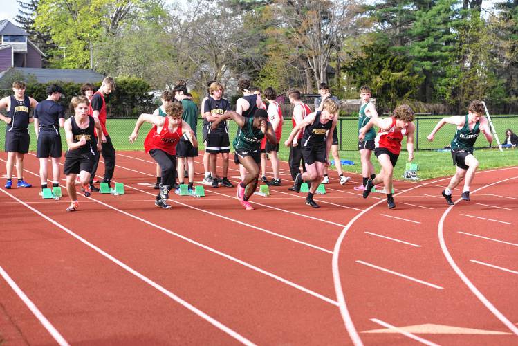 Athletes from Greenfield, Pioneer and Athol compete in the boys 100 during a meet in Greenfield on Wednesday. 