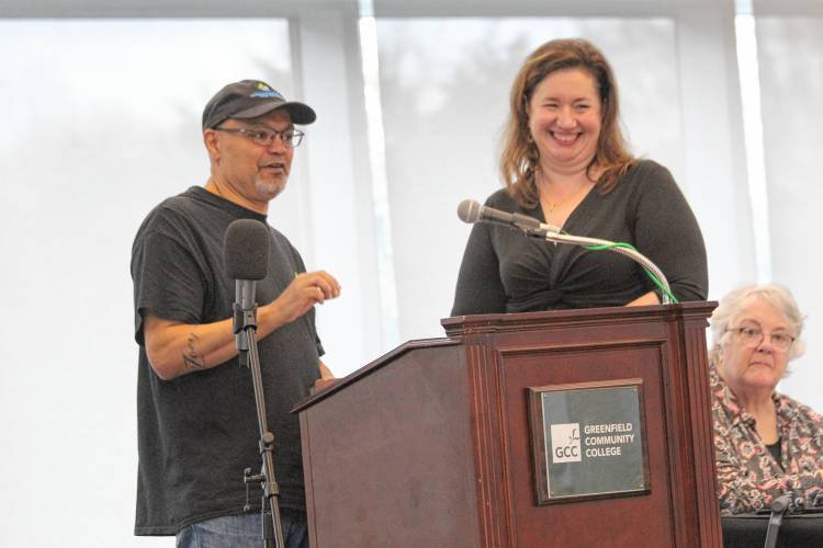 Cheo Ramos, of the Center for Self-Reliance, speaks alongside Community Action Pioneer Valley Associate Director of Community Engagement Jess Thompson at the agency’s 2024 annual meeting and 60th anniversary celebration Friday morning at Greenfield Community College.