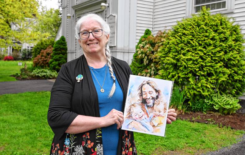 The Rev. Linda M. Rhinehart Neas outside the Sunderland Congregational Church.