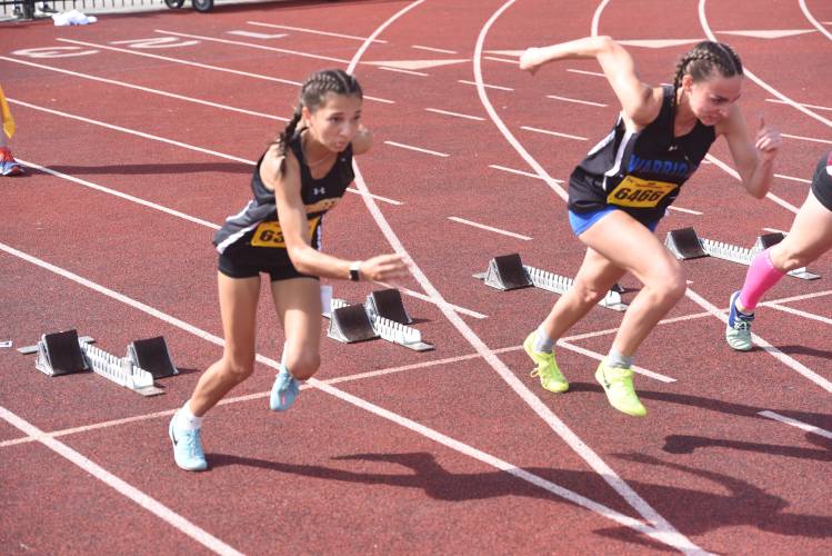 Pioneer's Sahana Heilman competes in the 100 hurdles at the MIAA Div. 6 State Championship Track and Field Meet at Merrimack College Saturday. 