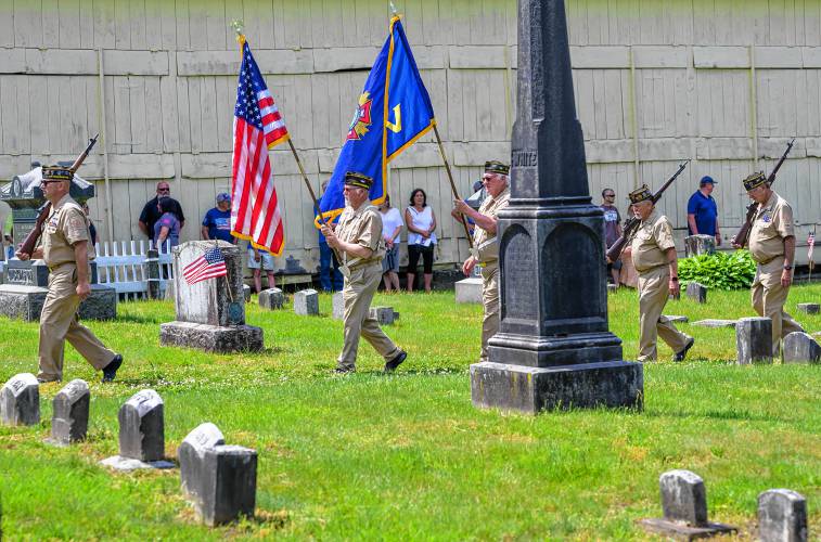 Honor guard members from the Hale-Clapp Veterans of Foreign Wars Post 3295 march during the Whately Memorial Day parade on Sunday.