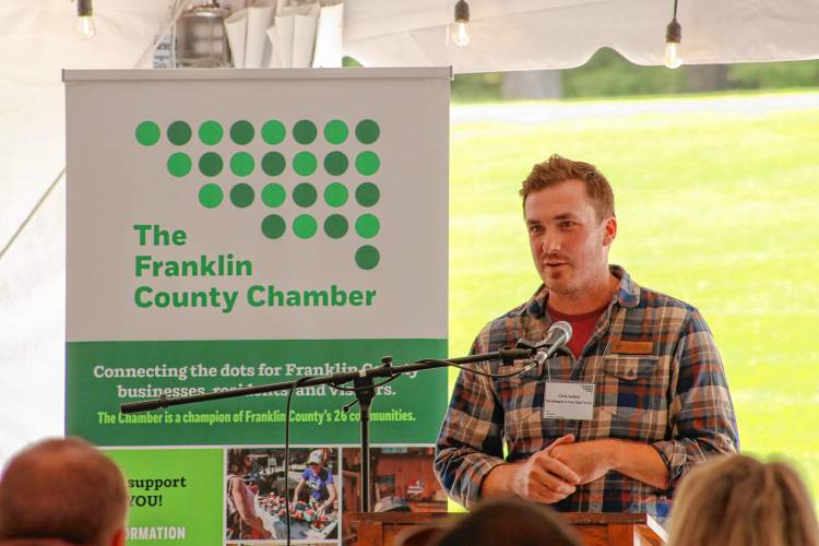 Chris Sellers, co-owner of The Brewery at Four Star Farms in Northfield, speaks during the Franklin County Chamber of Commerce’s May luncheon, “Art of the Craft,” at the Northfield Golf Club.