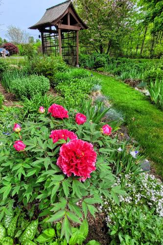 The Greenfield Garden Club’s 28th Garden Tour, scheduled for this Saturday, enables visitors to gain inspiration for their own gardens and to ask questions along the way.