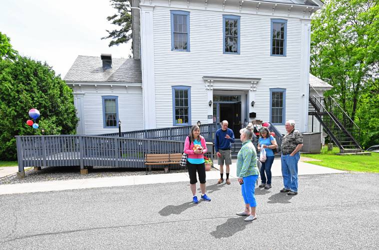 People talk outside the Bernardston Senior Center during an open house on May 31. The Bernardston Senior Center has been named an Honorable Mention in the National Institute of Senior Centers’ Programs of Excellence Awards for a diverse marketing campaign that led to significantly increased membership.