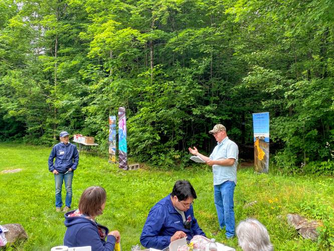 Rene Wendell, a land steward with The Nature Conservancy, addresses visitors to the Hawley Bog on Tuesday during a celebration marking 50 years since the site was declared a National Natural Landmark.