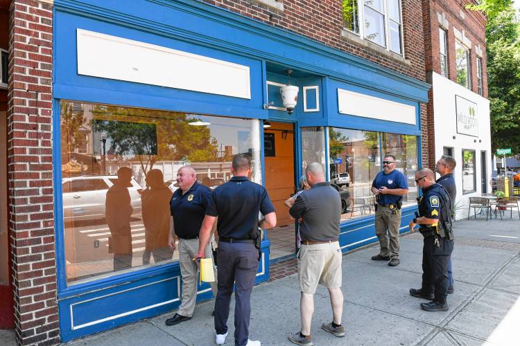 Police check out 205 Main St. in Greenfield, where they plan to open a substation for police to have a downtown presence.