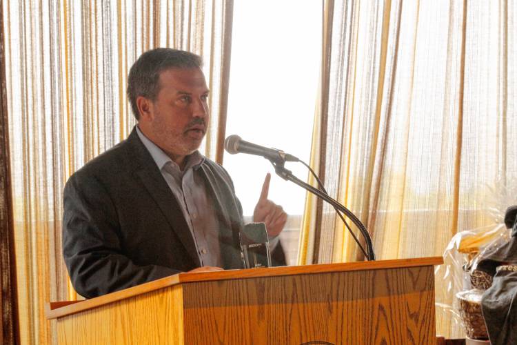 Rep. Aaron Saunders, D-Belchertown, speaks at the Franklin County Chamber of Commerce’s annual legislative breakfast at Eaglebrook School in Deerfield on Friday morning.