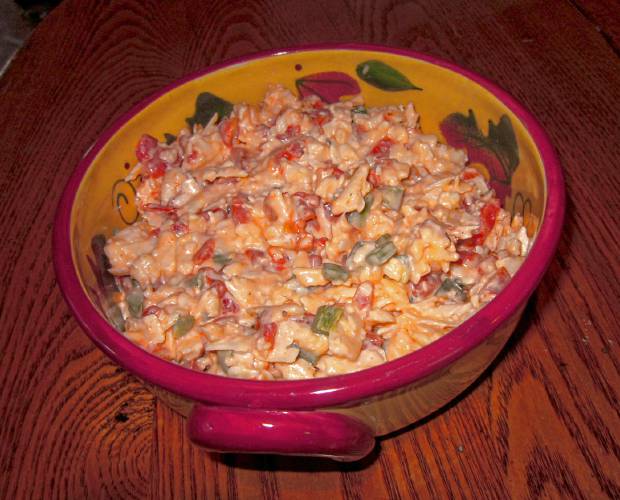 Unblended pimiento cheese. Interestingly, although pimiento cheese is associated with the South, where many people omit the Spanish-inspired second “i” and call it “pimento cheese,” it originated in New York in the early 1900s.