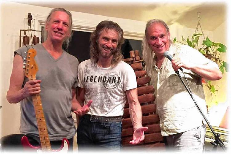 Do it Now, the trio of percussionist Tony Vacca, guitarist John Sheldon, and poet Paul Richmond, return to Peskeomput Park in Turners Falls for a free show on Sunday from 2 to 4 p.m.