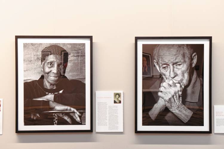 Leyden native Joe Wallace’s portrait series called “The Day After Yesterday,”  showcasing Massachusetts residents living with dementia, is on display in the Greenfield Public Library meeting room.