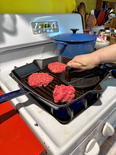 Contrary to my mother’s kitchen lore, flattening a burger (and cooking it over high heat) actually seals the juices inside the meat. It also provides more surface area for a nice crusty outside.