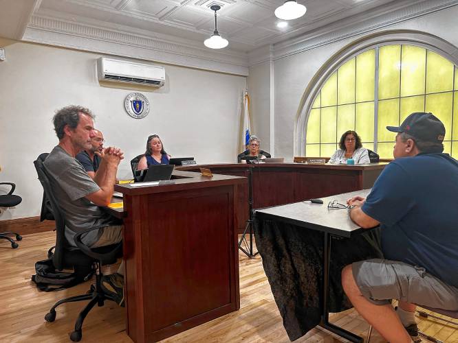 EMS Chief Mark Fortier, at right, speaks with the Northfield Selectboard at Town Hall on Tuesday.