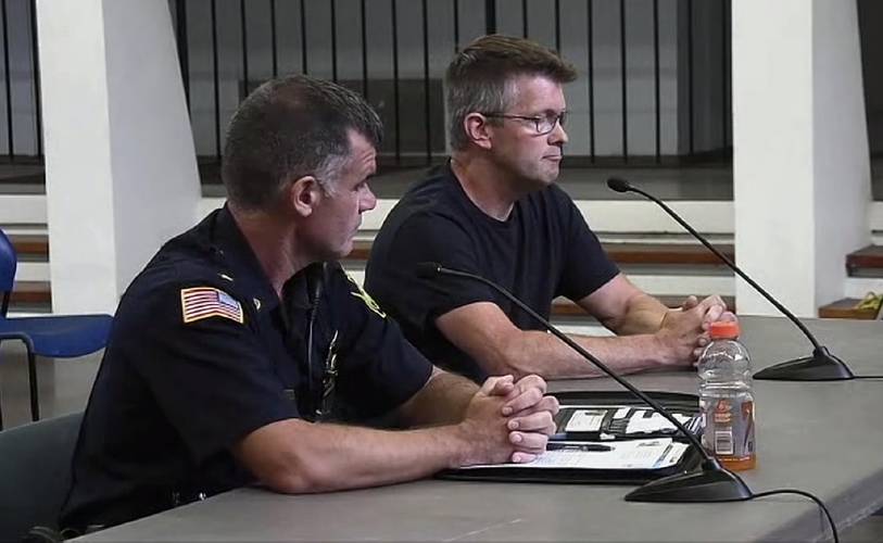 Deerfield Police Chief John Paciorek Jr. and Steve Schechterle, owner of The Spirit Shoppe, speak at the Deerfield Selectboard meeting on Wednesday.