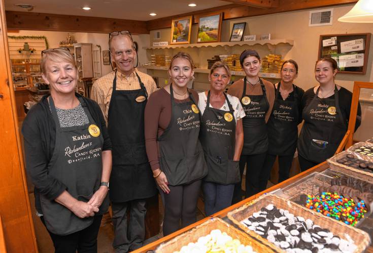 Kathie Williams, left, of Richardson’s Candy Kitchen and her staff are celebrating 70 years in business.