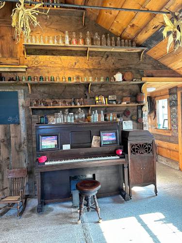 Visitors are encouraged to give the old piano player a try while visiting Wheel-View Farm in Shelburne. Co-owner and curator Carolyn Wheeler says visitors may choose from numerous music rolls, and that participants can make beautiful music simply by pumping the pneumatic mechanism with their feet.