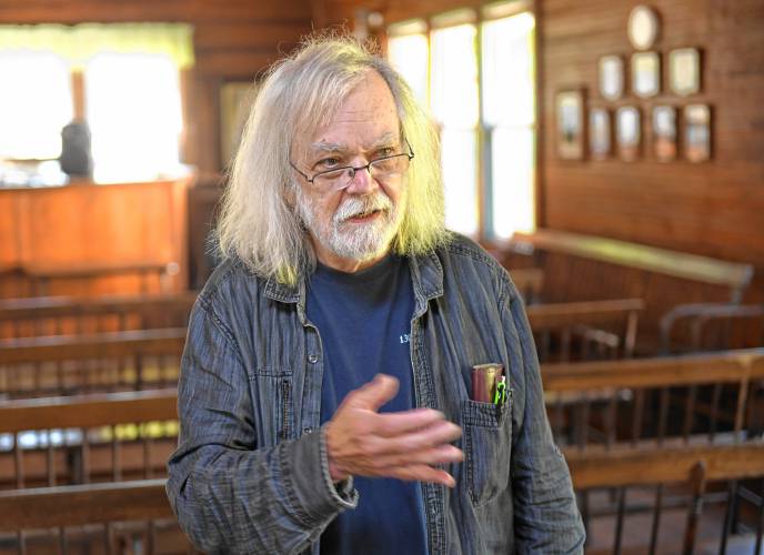 The National Spiritual Alliance Vice President and acting CEO David James, pictured in Tabor Thompson Memorial Temple in Lake Pleasant.