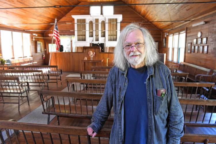 The National Spiritual Alliance Vice President and acting CEO David James, pictured in Tabor Thompson Memorial Temple in Lake Pleasant.