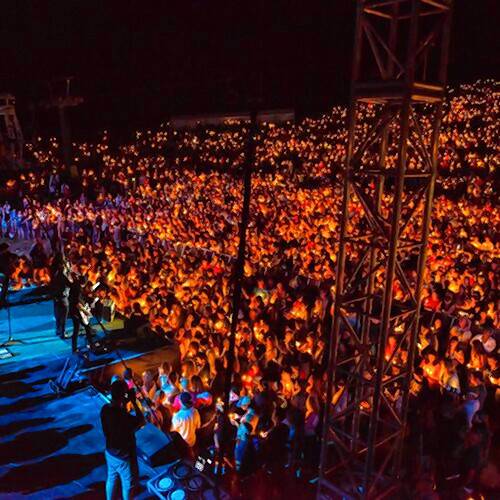 Attendees at a previous SoulFest holding candles during a performance. The Christian music festival comes to Greenfield this year, and will take place at the Franklin County Fairgrounds Aug. 15-17.